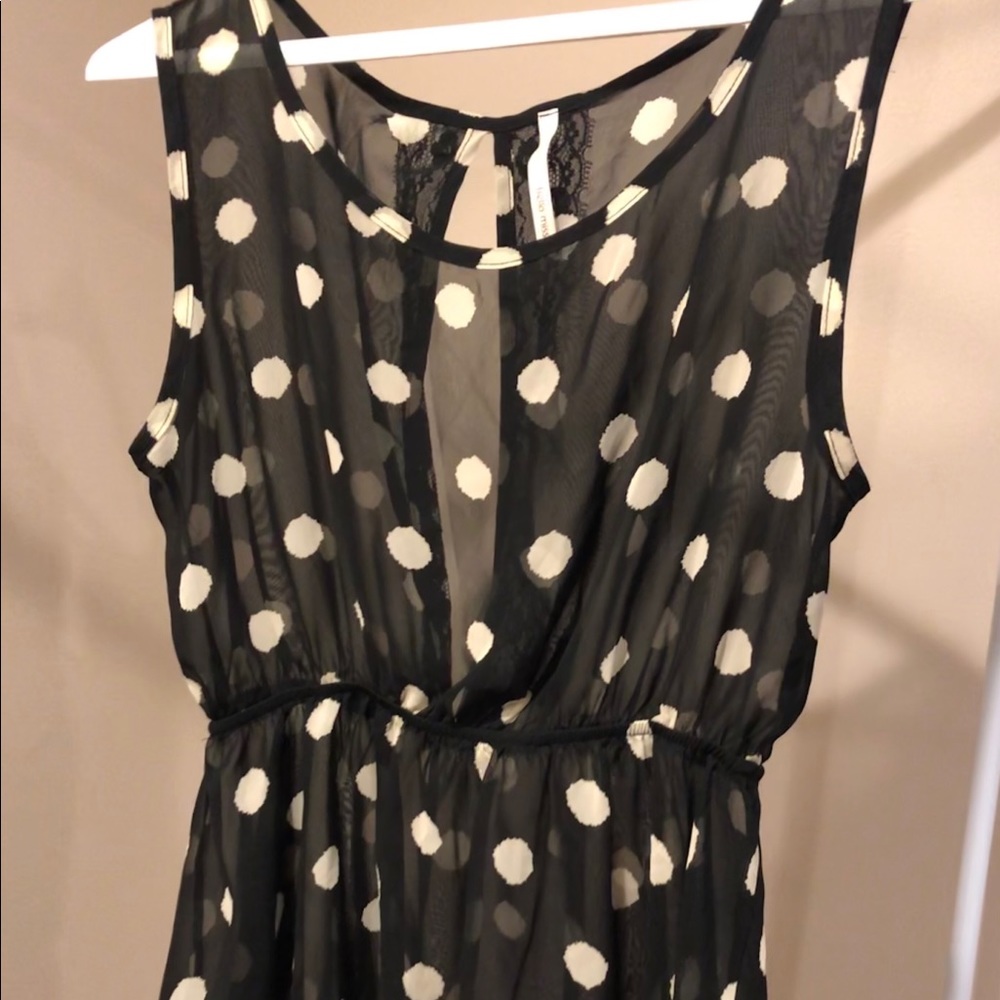 Sheer polka dot peplum top